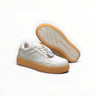 EWW Sports Shoes Alo Yoga Recovery Mode low-top sneakers in beige with a gum rubber outsole and minimalist design.