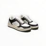 EWW Sports Shoes Alo Yoga Recovery Mode low-top sneakers in black and white with a cushioned sole and lace-up design.