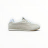 EWW Sports Shoes Alo Yoga Sunset beige low-top lifestyle sneakers with a suede upper and white lace-up closure.
