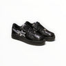 EWW Sports Shoes BAPE STA low-top sneakers in black patent leather with a silver star logo and lace-up closure.