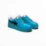 EWW Sports Shoes BAPE STA low-top sneakers in glossy blue patent leather with a black star logo and lace-up closure.