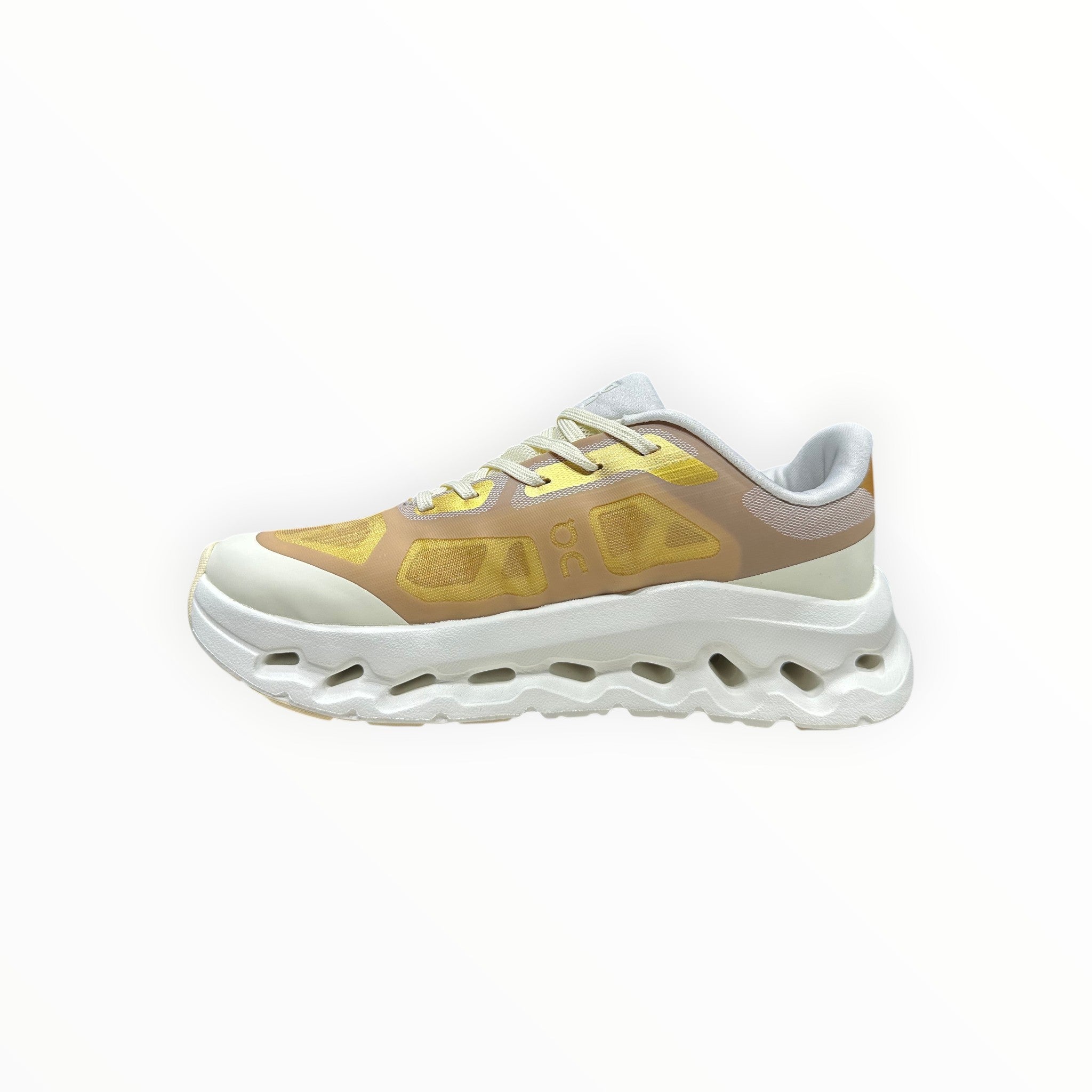 EWW Sports Shoes On Cloudtilt Remix gold and white sneakers with a see-through x-ray effect upper and white chunky sole.