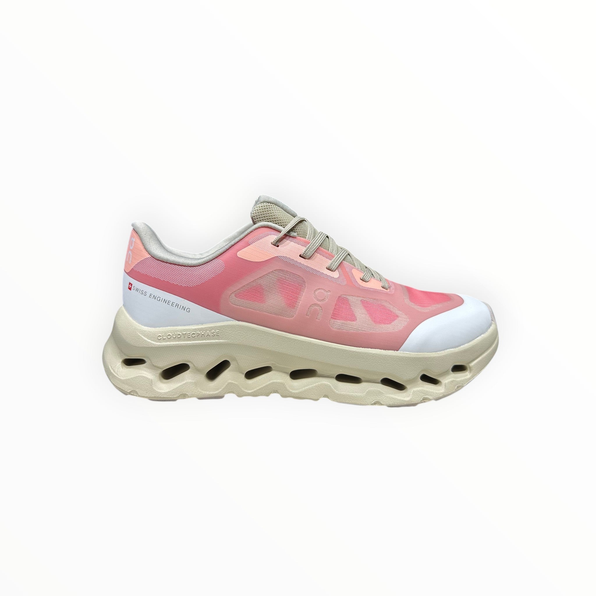 EWW Sports Shoes On Cloudtilt Remix pink and cream running shoes with see-through upper and chunky sole.