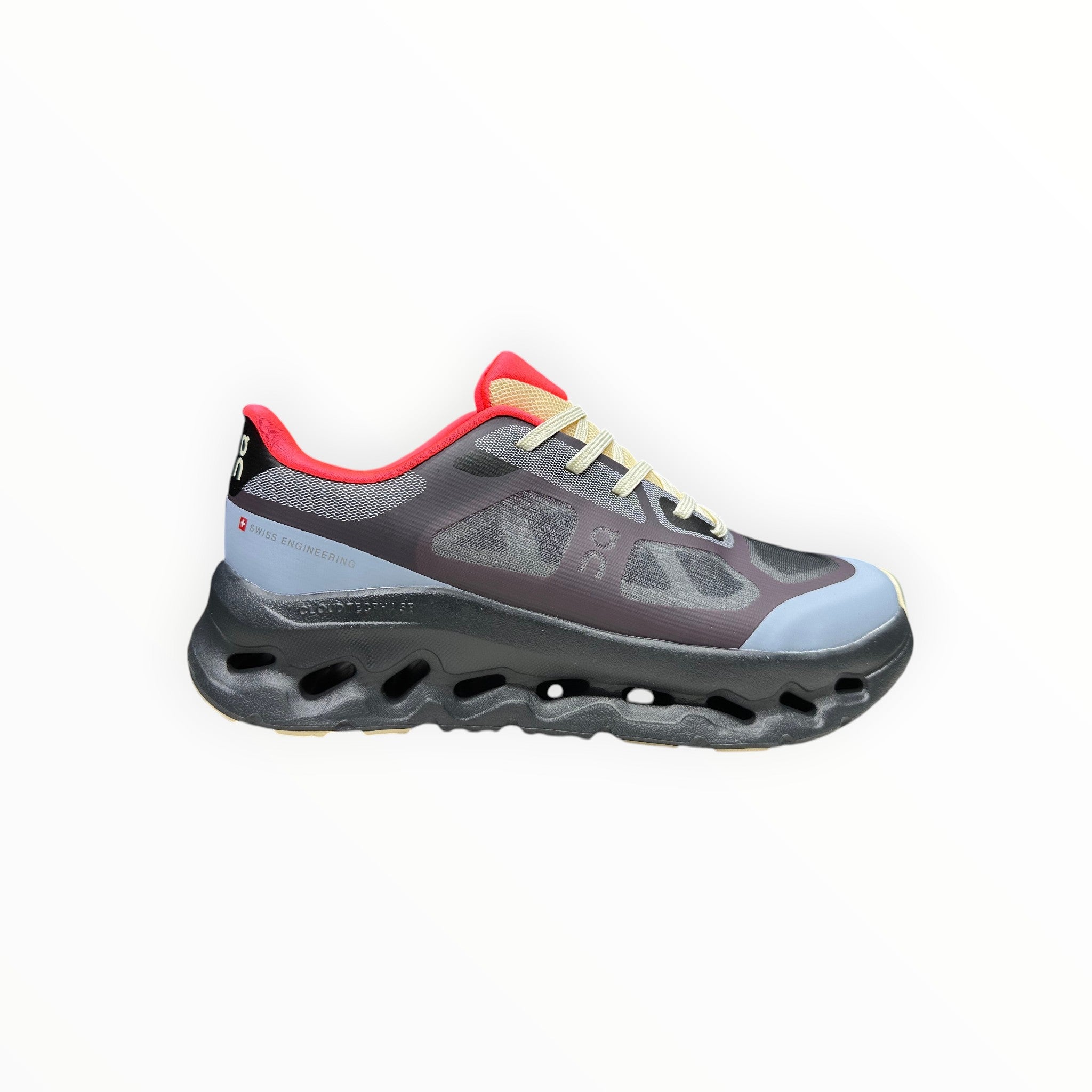 EWW Sports Shoes On Cloudtilt Remix black and light blue running shoe with layered see-through upper and chunky black sole.
