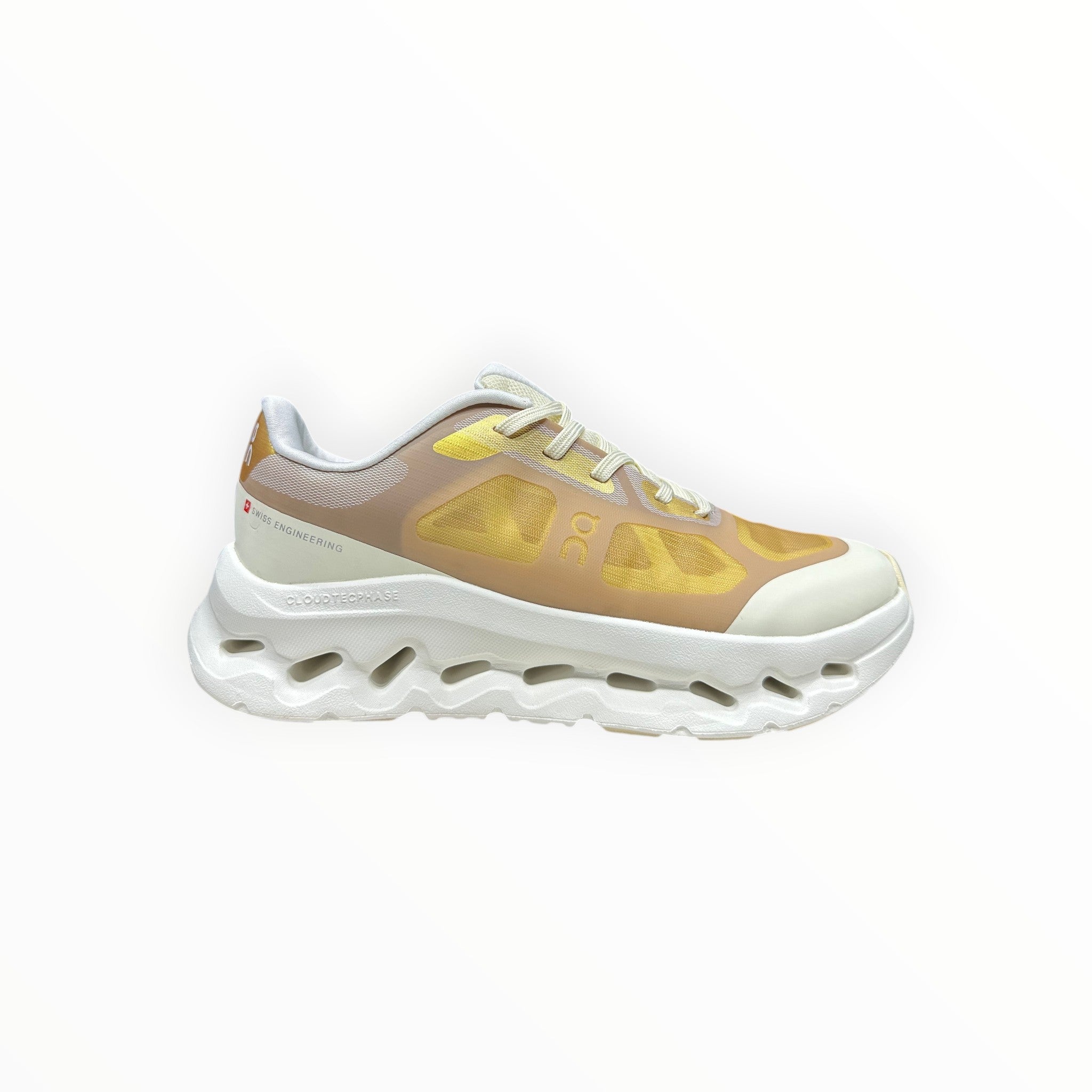 EWW Sports Shoes On Cloudtilt Remix gold and white running shoe with see-through x-ray effect upper and white CloudTec Phase midsole.
