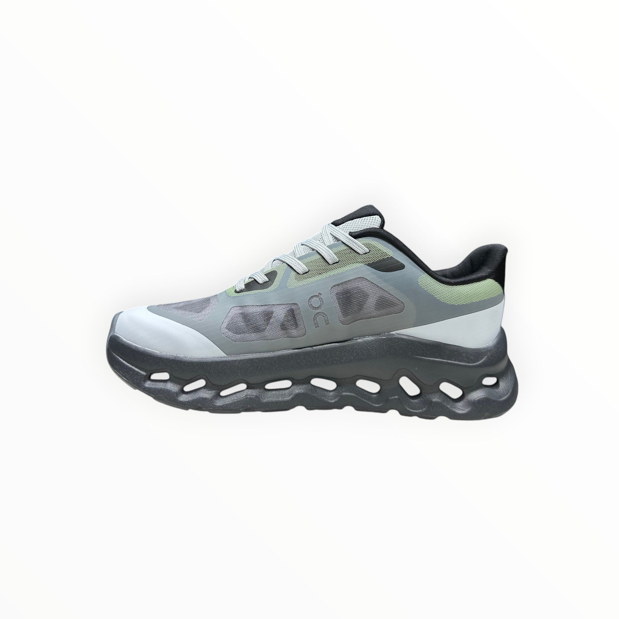 EWW Sports Shoes On Cloudtilt Remix grey and black running shoe with see-through x-ray effect upper and chunky black sole.