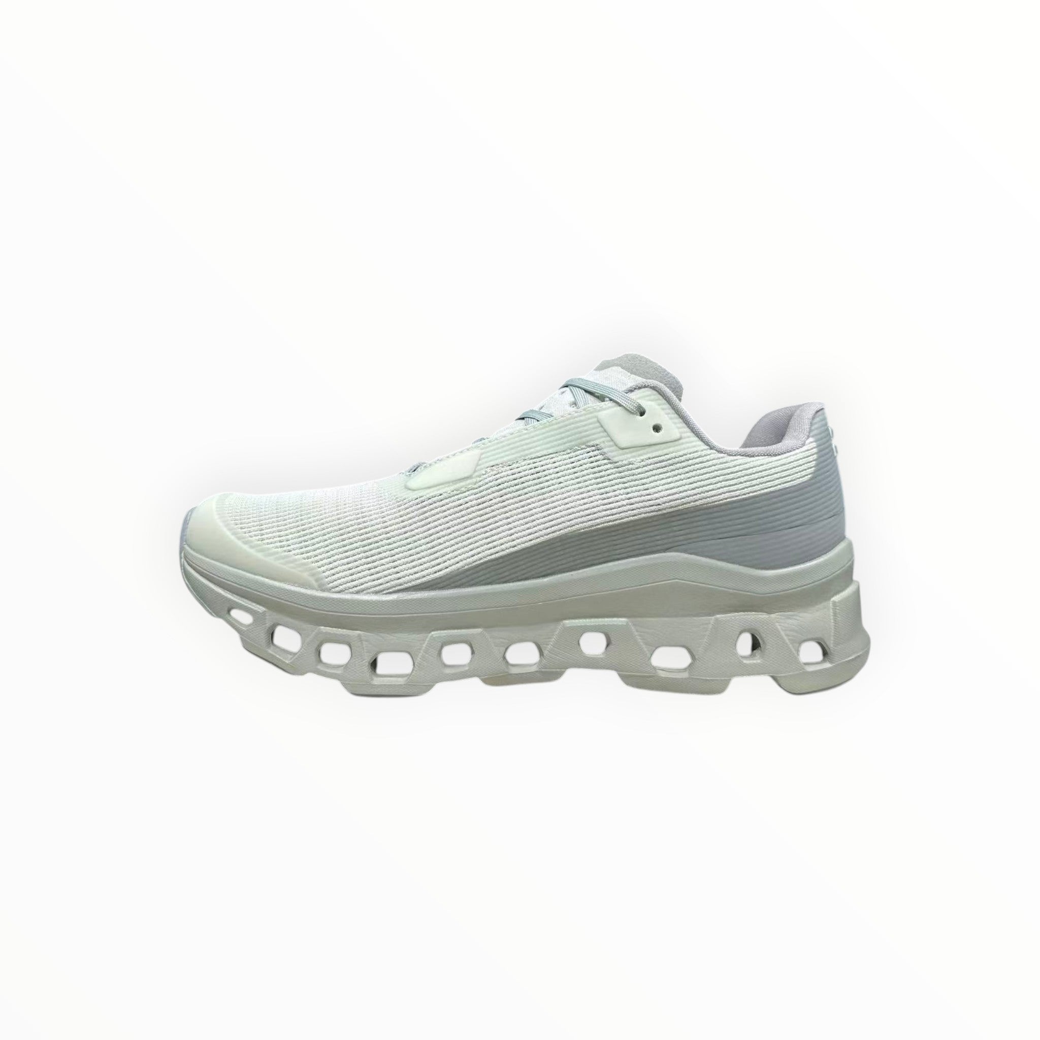 EWW Sports Shoes On Running Cloudmonster Void grey running shoe with breathable mesh upper and large cushioned sole.