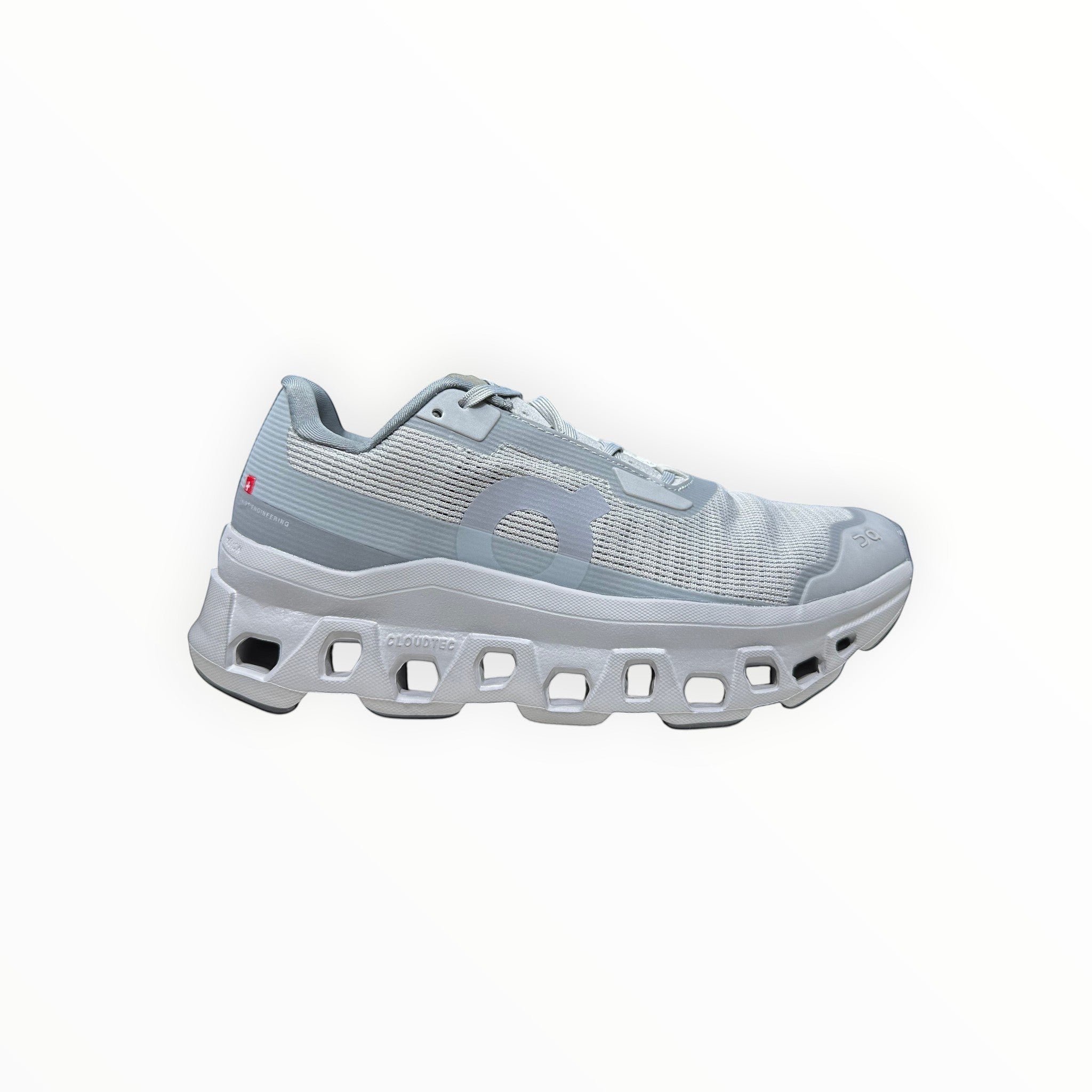 EWW Sports Shoes On Running Cloudmonster Void men's running shoe in light gray breathable mesh with signature CloudTec cushioning.