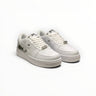 EWW Sports Shoes BAPE STA triple white low-top sneakers featuring a star logo and lace-up closure.